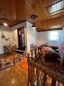 a living room with a couch and a table at Kokkotis Residence in Samarina