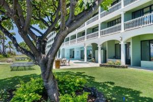 a building with a tree in front of it at Lahaina Shores PH1 · LS PH1 Oceanfront Penthouse Condo w Panoram in Lahaina