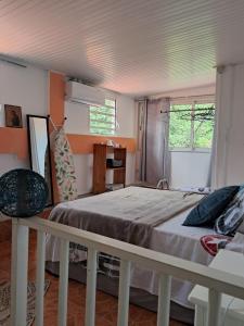 Ένα ή περισσότερα κρεβάτια σε δωμάτιο στο Maison