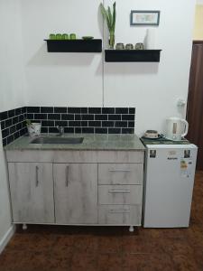 Η κουζίνα ή μικρή κουζίνα στο Pequeño Monoambiente en S Fernando