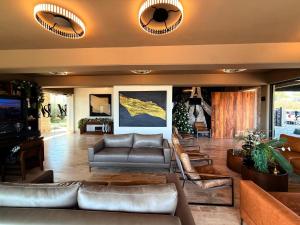 Posezení v ubytování Hotel Montessuites