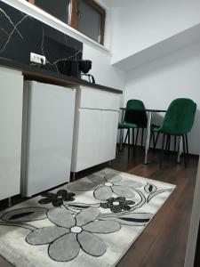 Kuchyň nebo kuchyňský kout v ubytování Mini Apartament 2