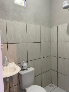 Koupelna v ubytování Aratu Pousada