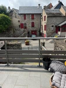 a view from a balcony of a house at Gite du Lac Pavin in Besse-et-Saint-Anastaise