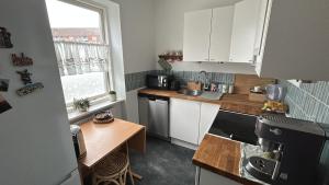 Η κουζίνα ή μικρή κουζίνα στο Cozy private living room in Kastanie Allé