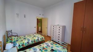 Postel nebo postele na pokoji v ubytování Stella Marina