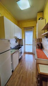 Kuchyň nebo kuchyňský kout v ubytování Stella Marina + 11 fotografií