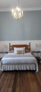 Ένα ή περισσότερα κρεβάτια σε δωμάτιο στο Viña del Mar Playa Jardín, entre Agua Santa y El Reloj de Flores