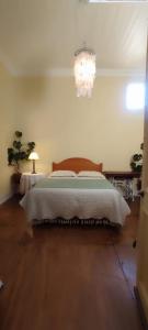 Ένα ή περισσότερα κρεβάτια σε δωμάτιο στο Viña del Mar Playa Jardín, entre Agua Santa y El Reloj de Flores