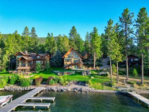 an aerial view of a large house with a lake at Lakefront Beauty in Rocky Point