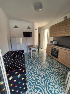 Køkken eller tekøkken på Pali's Rooms & Lodges