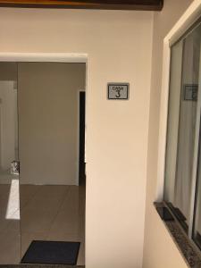 Koupelna v ubytování Quarto para 3 pessoas