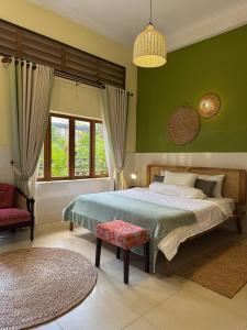 Кровать или кровати в номере Serene City Hideaway in Phnom Penhs Heart