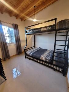 En eller flere senge i et værelse på El Cerrito