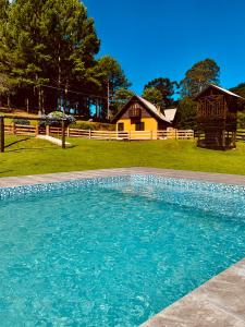 Πισίνα στο ή κοντά στο Cabanas em Canela - Leão da Tribo de Judá