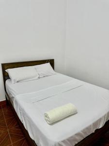 Ένα ή περισσότερα κρεβάτια σε δωμάτιο στο Estancia Charito +2 φωτογραφίες