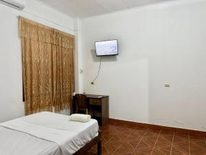 Ένα ή περισσότερα κρεβάτια σε δωμάτιο στο Estancia Charito