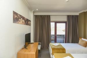 Μια τηλεόραση ή/και κέντρο ψυχαγωγίας στο Dom Joao Hotel