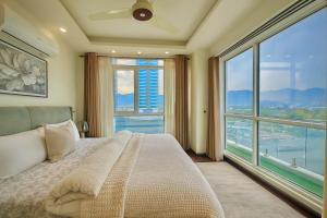 Ένα ή περισσότερα κρεβάτια σε δωμάτιο στο Elysium Tower Boutique Apartments Facing Centaurus Mall Islamabad