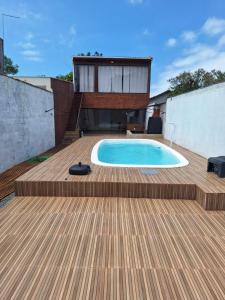 Πισίνα στο ή κοντά στο Casa Boraceia Litoral Norte SP