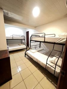 Postel nebo postele na pokoji v ubytování Casa Lapas