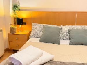 Giường trong phòng chung tại VUT Plaza Florida - Parking gratis