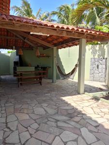 En terrasse eller udendørsområde på casa maré alta