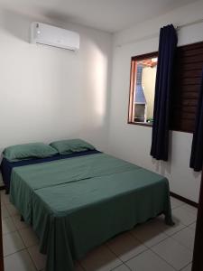 En eller flere senge i et værelse på casa maré alta