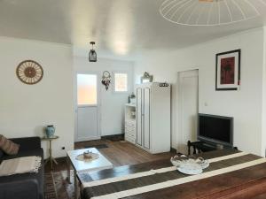 Μια τηλεόραση ή/και κέντρο ψυχαγωγίας στο Grand Duplex, proche de la Dordogne