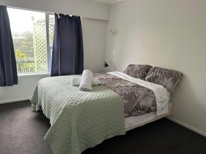 Ένα ή περισσότερα κρεβάτια σε δωμάτιο στο B&B near CBD