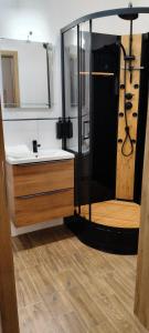 Ένα μπάνιο στο Drzewna Apartamenty-Wojska Polskiego