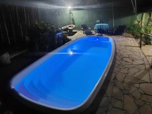 Swimmingpoolen hos eller tæt på Casa Soul Green Praia + 17 billeder