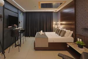 TV a/nebo společenská místnost v ubytování Hotel Motel Sherwood