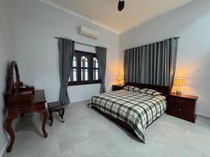 Φωτογραφία από το άλμπουμ του Spacious Siem Reap Sanctuary σε Phumĭ Ta Phŭl +27 φωτογραφίες