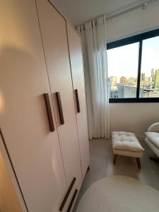 Ένα ή περισσότερα κρεβάτια σε δωμάτιο στο Apartamento Towers Centro Torres