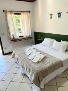 Foto dalla galleria di Suítes da Praia Paraty a Parati Altre 16 foto