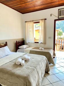 Foto dalla galleria di Suítes da Praia Paraty a Parati