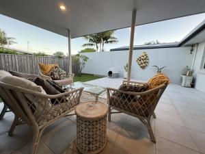 Et opholdsområde på Family Beachside Getaway