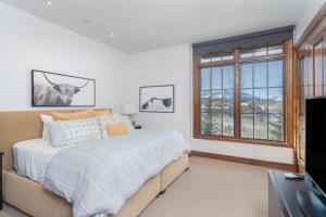 Ένα ή περισσότερα κρεβάτια σε δωμάτιο στο See Forever Residence 114 home