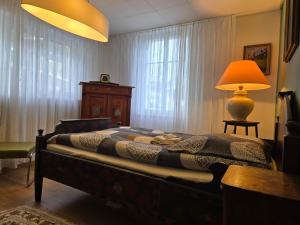 Un pat sau paturi într-o cameră la Weisses Haus - Parterre