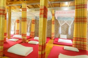 Giường trong phòng chung tại Ciao Homestay