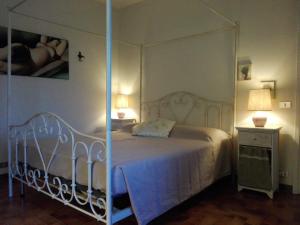 A bed or beds in a room at Casa Badinot