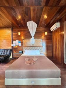 Ένα ή περισσότερα κρεβάτια σε δωμάτιο στο Bayview Hill Resort