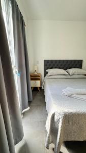 En eller flere senge i et værelse på A pocas cuadras de la playa