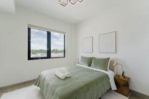 Ένα ή περισσότερα κρεβάτια σε δωμάτιο στο KOOSH - Boutique Aparthotel +98 φωτογραφίες