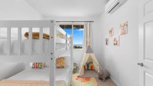 Ένα ή περισσότερα κρεβάτια σε δωμάτιο στο Lealea by AvantStay Ocean Mountain Views +53 φωτογραφίες