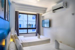 TV a/nebo společenská místnost v ubytování C Hotel Managed by H Hospitality Group