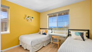 Ένα ή περισσότερα κρεβάτια σε δωμάτιο στο Ocean Views Modern New Build Yard 10min to Beach Ocean Escape by AvantStay +62 φωτογραφίες