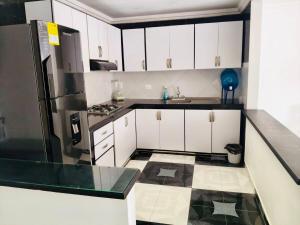 Kuchyň nebo kuchyňský kout v ubytování Apartamento - Líbano Tolima