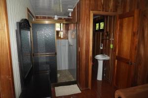 a bathroom with a toilet and a sink at Campo Azul #2 - Monteverde in Monteverde Costa Rica
